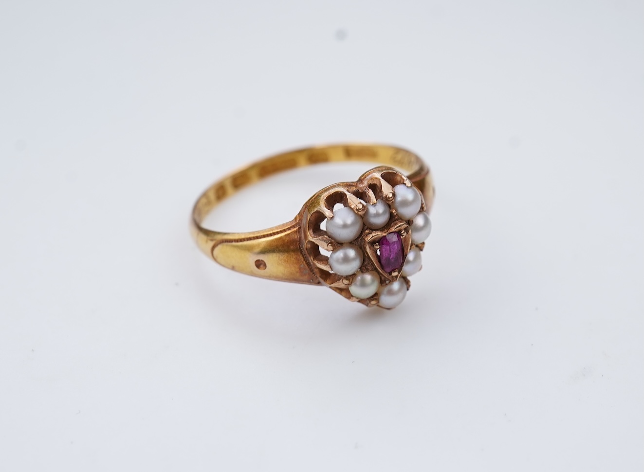 A Victorian pearl and ruby ring, circa 1871